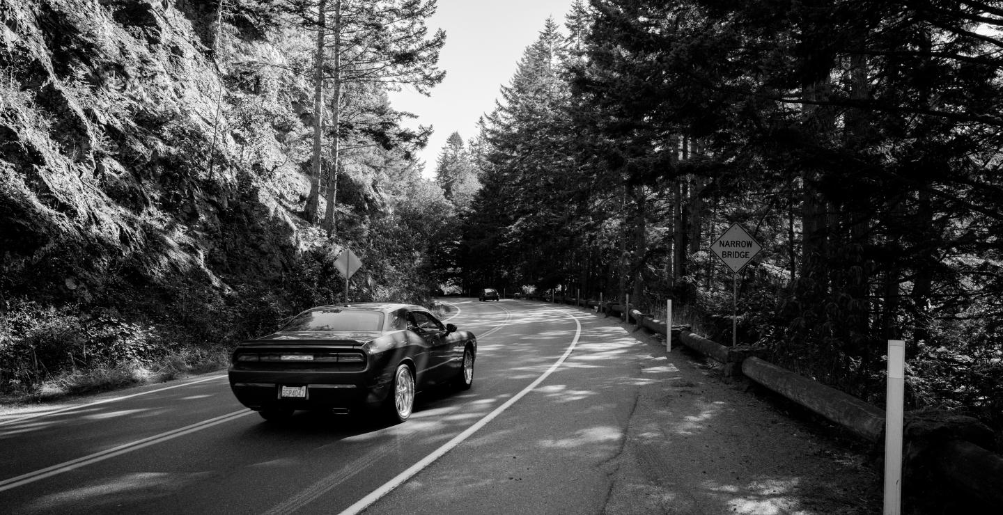a close up of a car going down the road