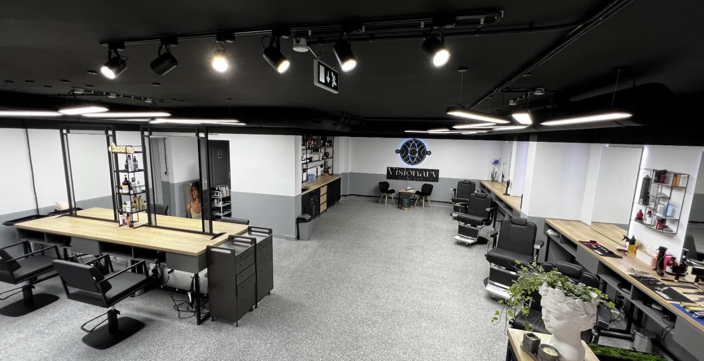 a room filled with furniture and a flat screen tv