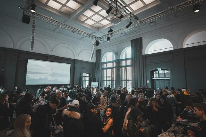 a large crowd of people in a room