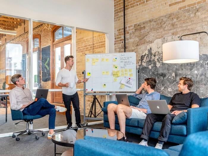 a group of people sitting in a room