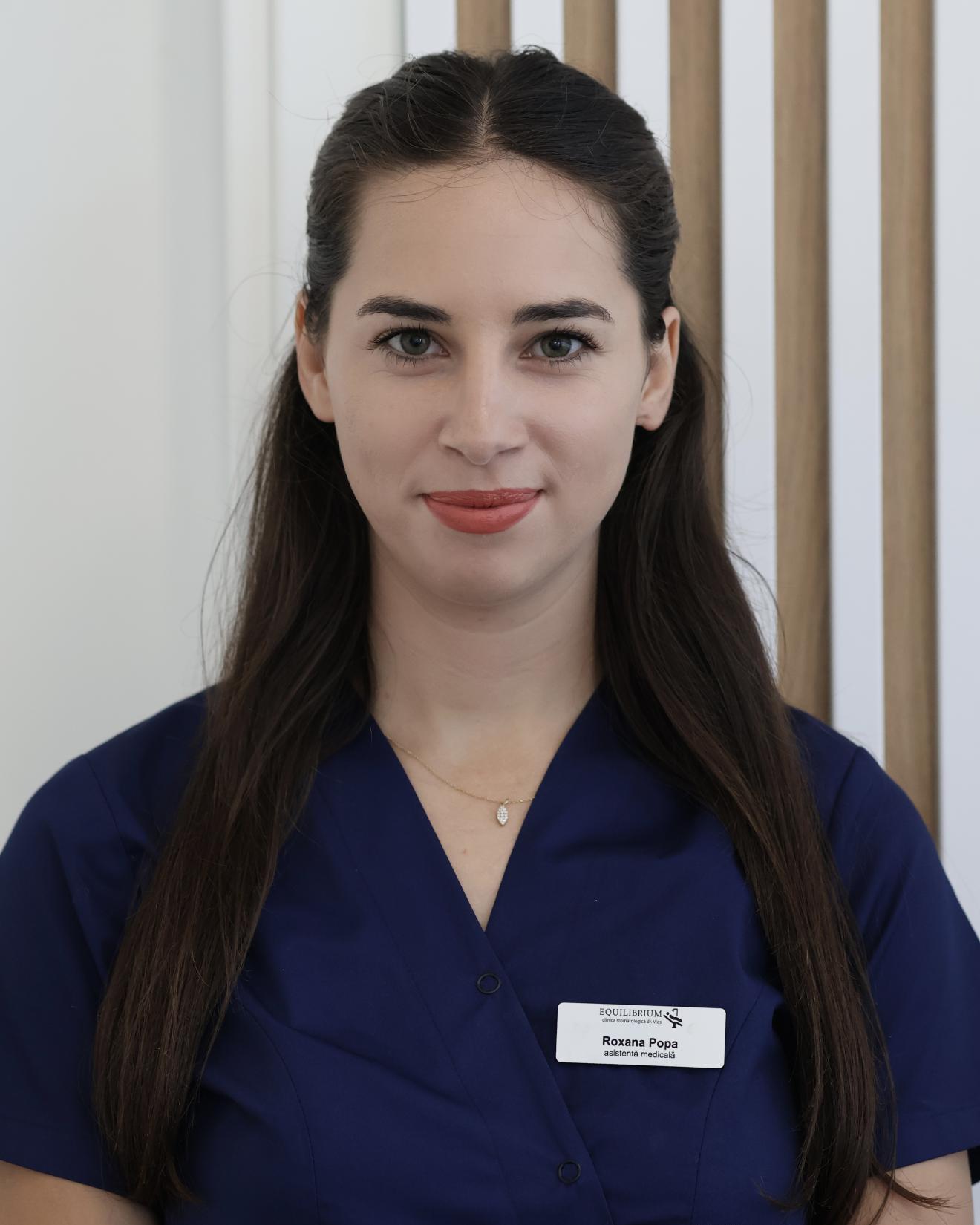 a woman wearing a blue shirt