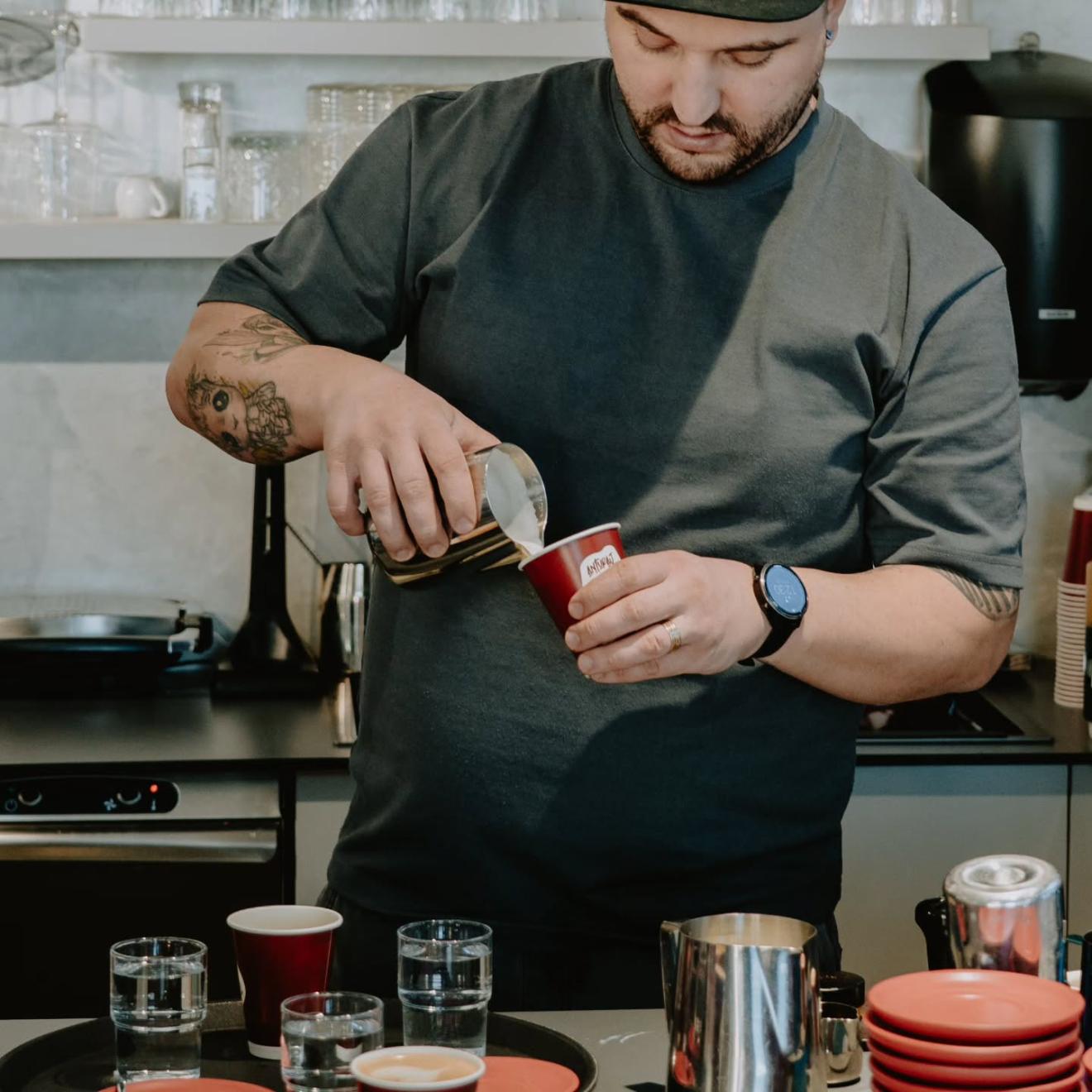 a man cooking in a kitchen