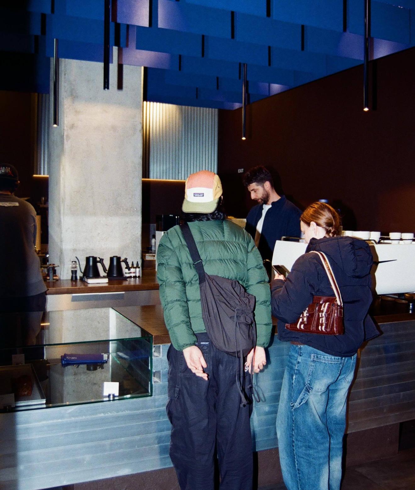 a group of people standing in a room