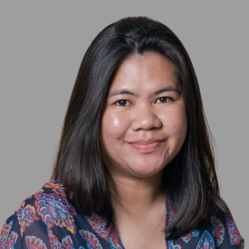 a woman smiling for the camera